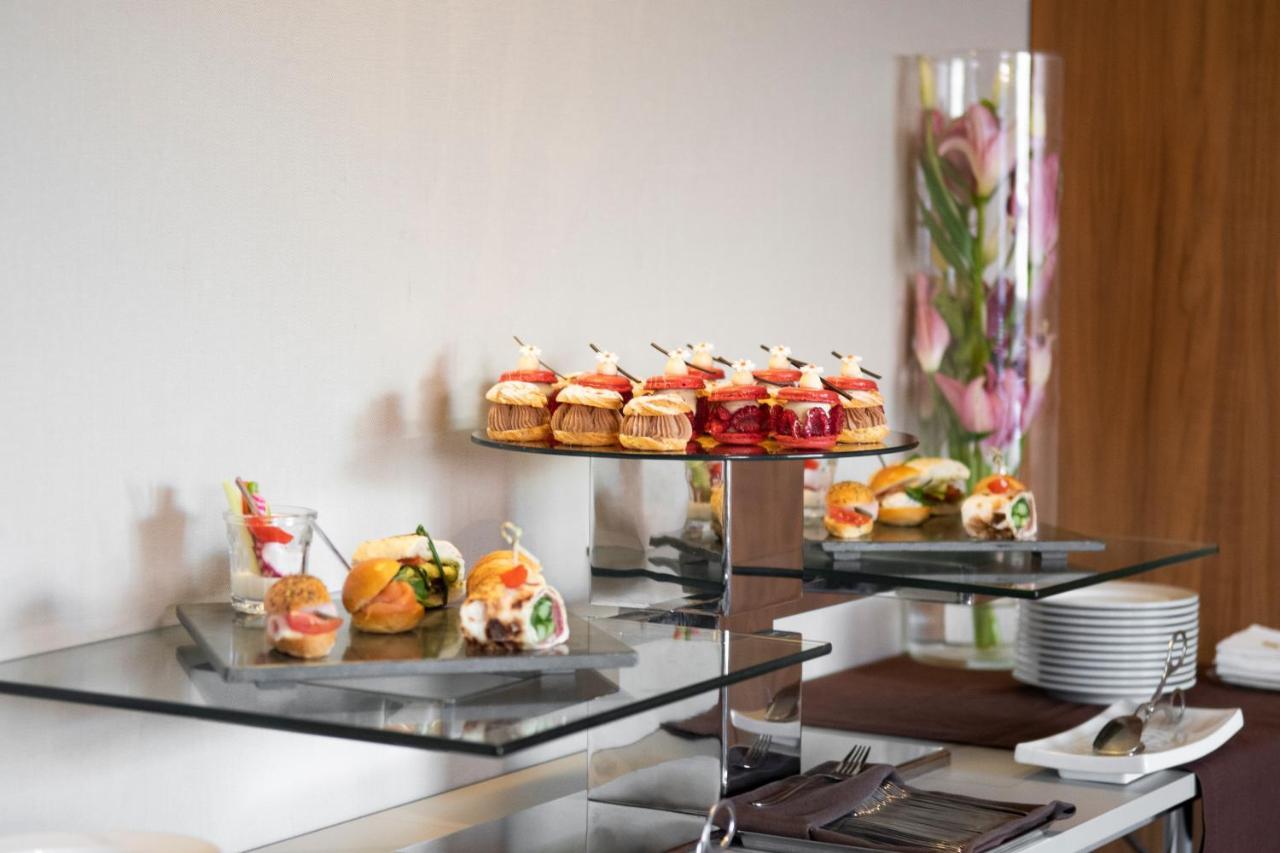 Epic Sana Lisboa Hotel Luaran gambar Finger food