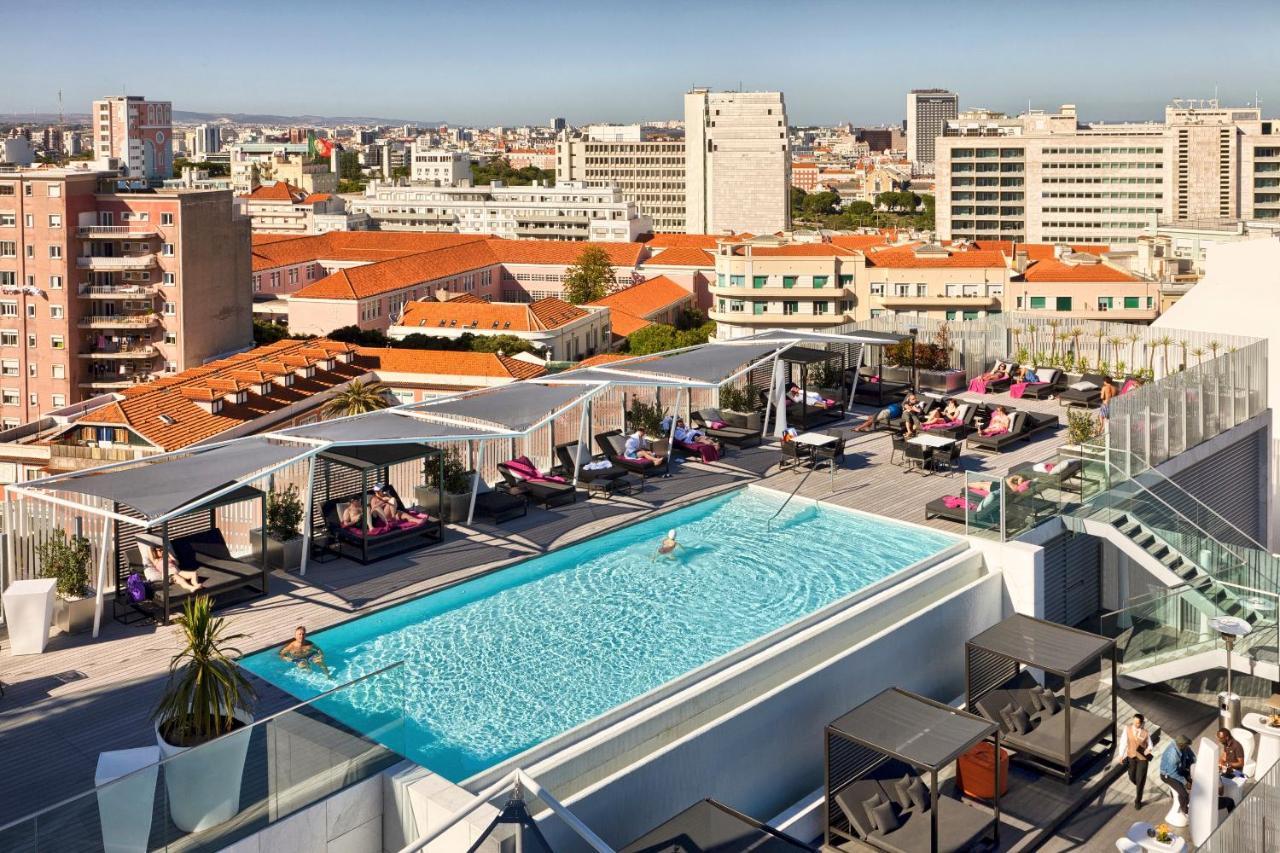 Epic Sana Lisboa Hotel Luaran gambar The rooftop pool at the Hilton Athens